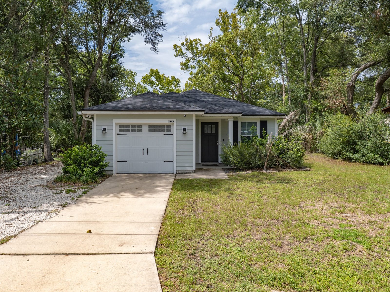 4649 Suray Avenue — Front Elevation with One-Car Garage & Concrete Drive
