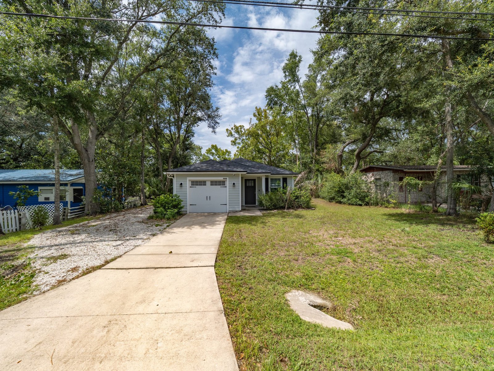 4649 Suray Avenue — Street View Down the Concrete Driveway