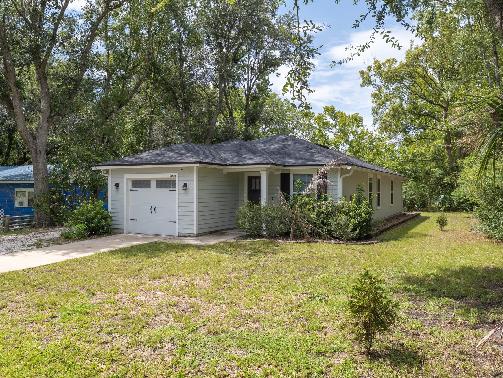 4649 Suray Avenue — Front & Side Elevation with Hip Roof and Lawn